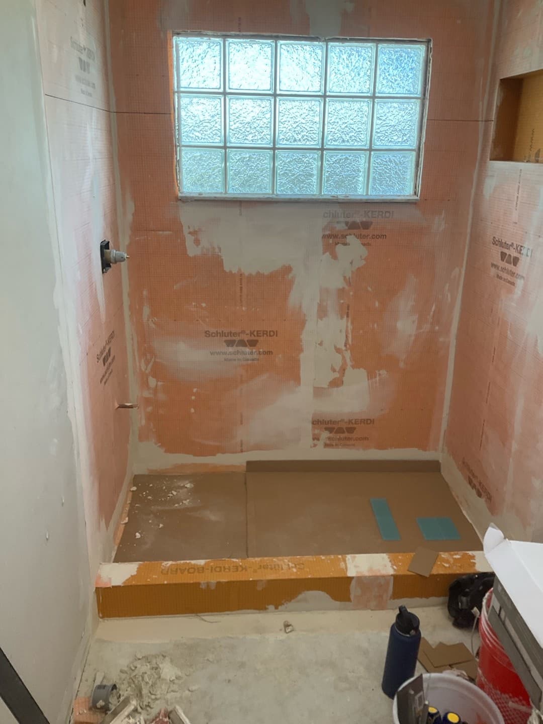 Schluter-Kerdi shower pan and membrane ready for tile, drain and niche framed in (real Karhan project)